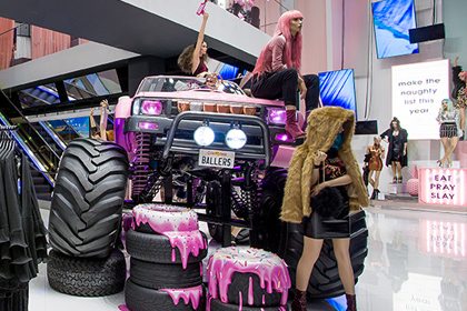 The monster truck is the focal point of Missguided's entrance, and is surrounded by oversized donut tyres, dripping with icing and sprinkles